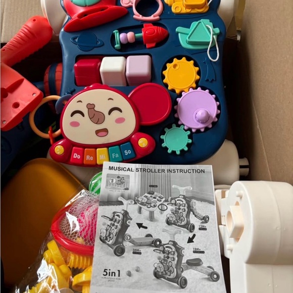 Colorful Ride-On Toy with Interactive Features - Picture 2 of 3